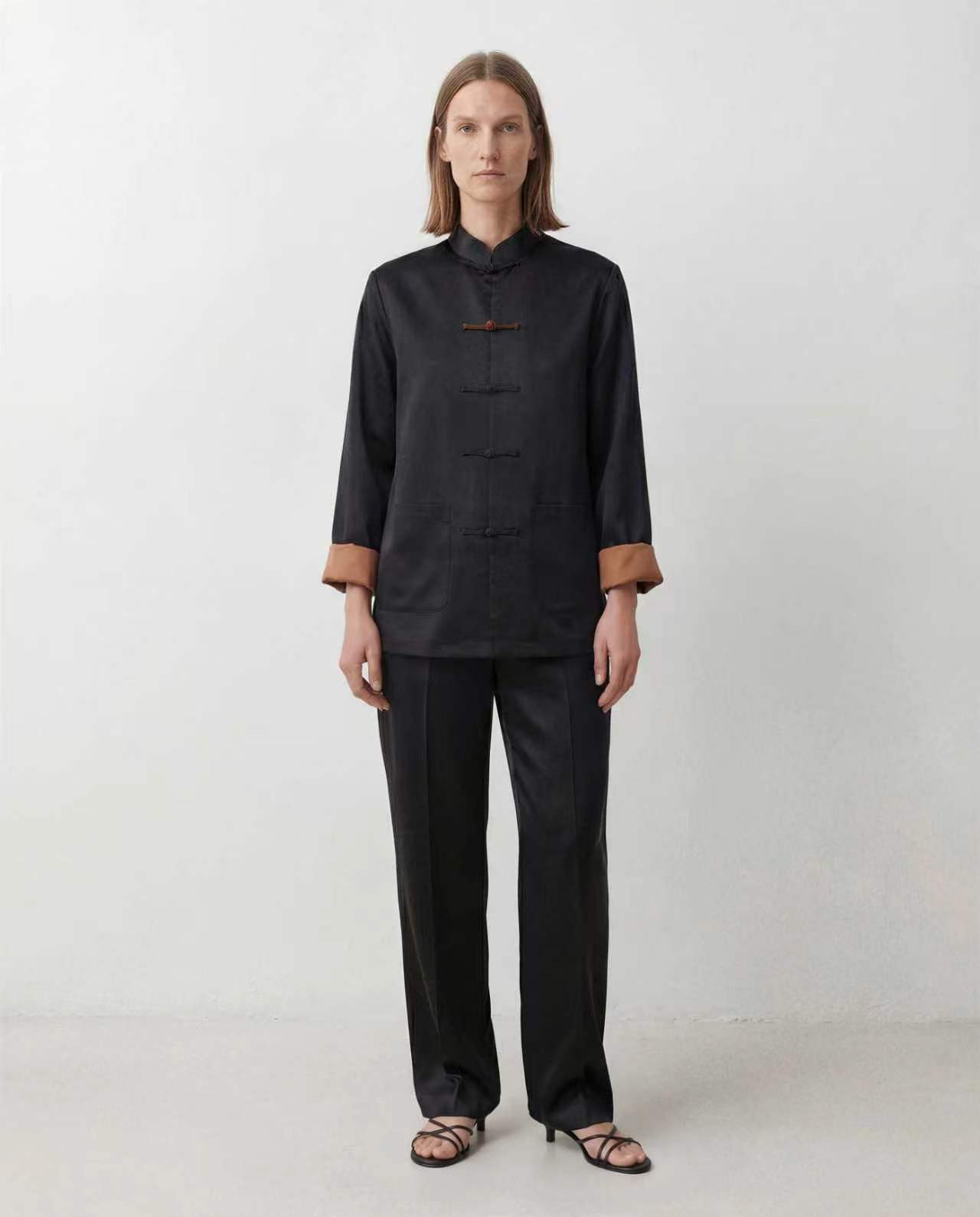 The Scholar Jacket in black, shown from the front