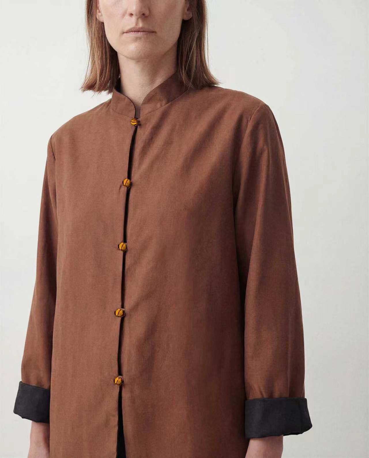 Russet side of the jacket, showing its contrasting cuffs and closures